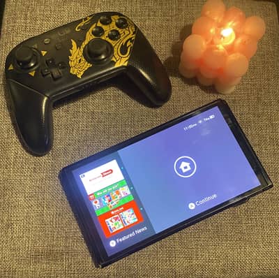 Nintendo switch oled with official nintendo pro controller included