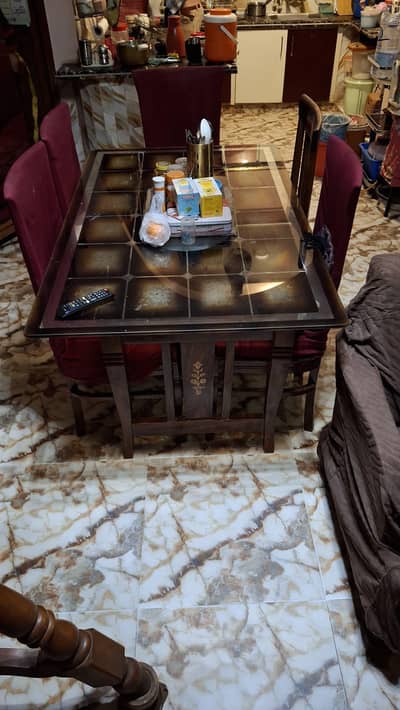 6 chairs ke sath solid wooden dining table for sale.