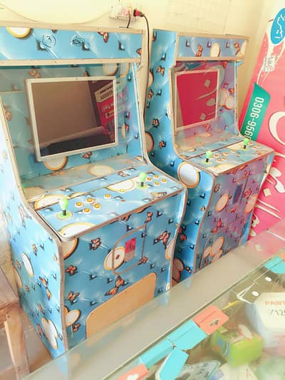 2 arcade token games,. good condition