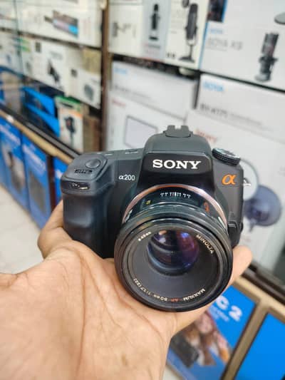 Sony alpha a200 with 50mm mintola lens  with accessories