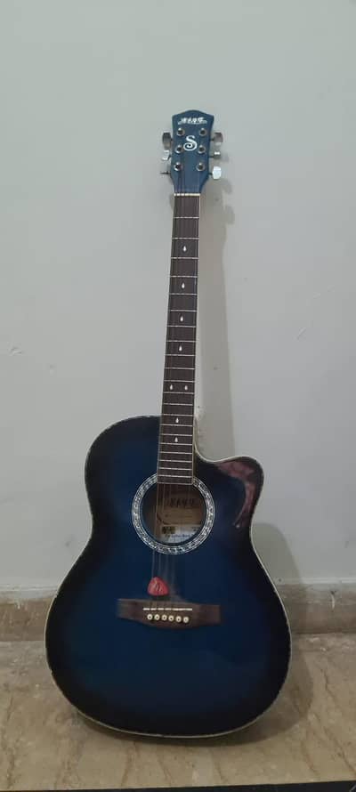 I am selling my guiter jambo size