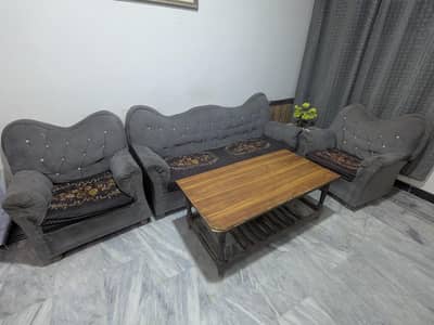 5 seater sofa with wooden table