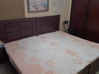 2 single wooden polished beds with 2 medicated mattresses