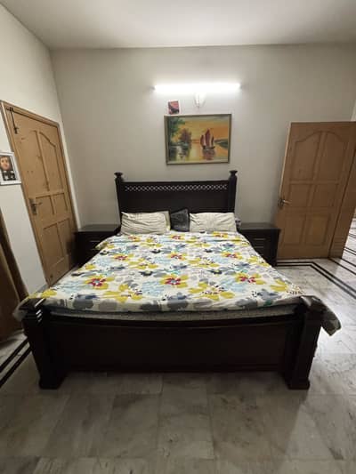 selling bed, side tables, dressing table, and small settee