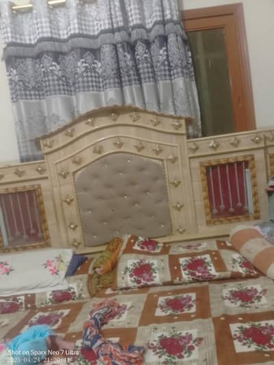 bed with side and dressing table