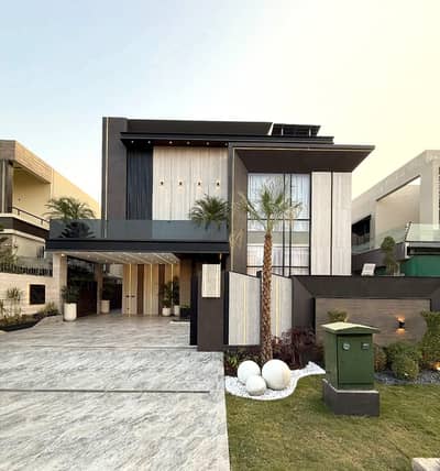 One Kanal Brand New Luxury Ultra-Modern Design Most Beautiful Fully Furnished Bungalow 2 Servant Quarter In Basement For Sale At Prime Location Of DHA Lahore Near To Park Masjid & Defence Raya Fairways Commercial.