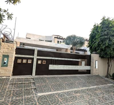 2 Kanal Used Modern Design Most Beautiful Owner Build Bungalow For Sale At Prime Location Of Dha Lahore Near To Park Masjid & Commercial Market .