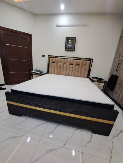 KING SIZE BED WITH BRASS AND HEAVY WOOD