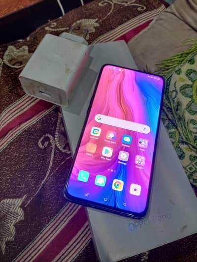 Oppo Reno 8/128 Orignal box n Charger (back break)