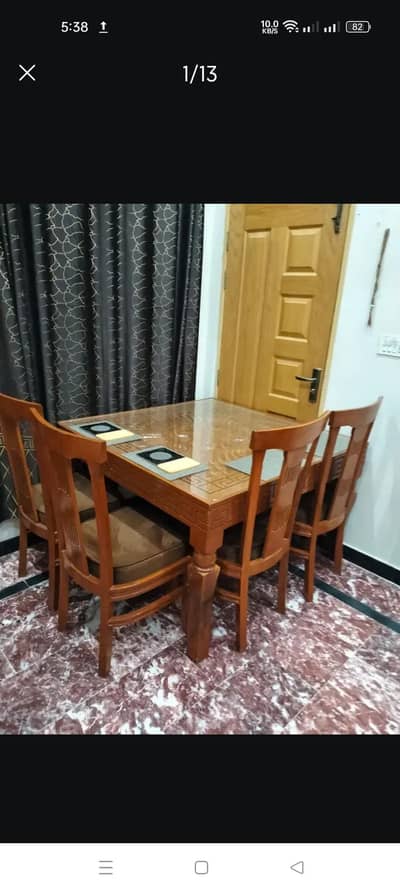 Solid Wood 4 Seater Dining Table with Glass Top and Cushioned Chairs