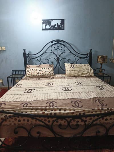 rod iron bed king size with side table and  iron rod 3 seater sofa