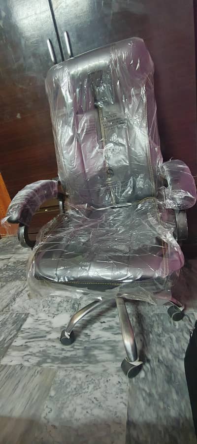 computer and rolling chair