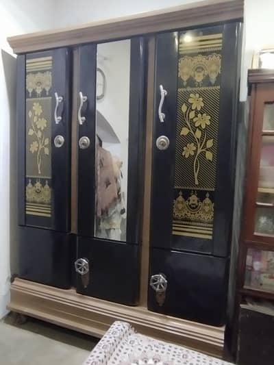 Three-door iron wardrobe for sale