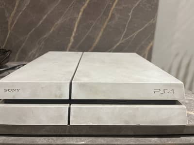 PS4 with 3 controllers and 6 games
