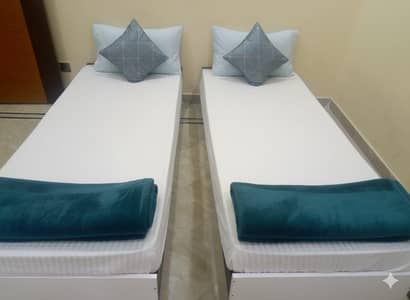 2 single beds for with mattresses \ single beds \ beds \ wooden \ foam