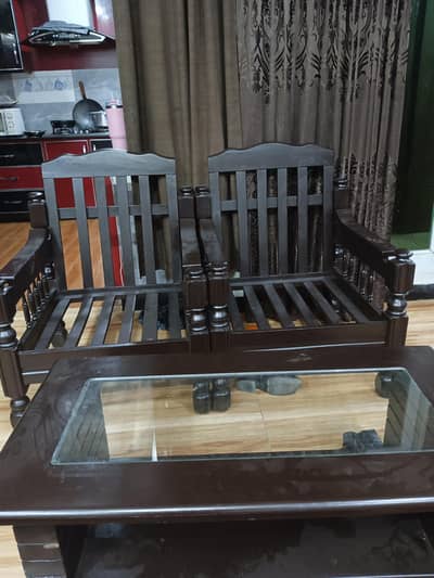 2sofa chairs with table