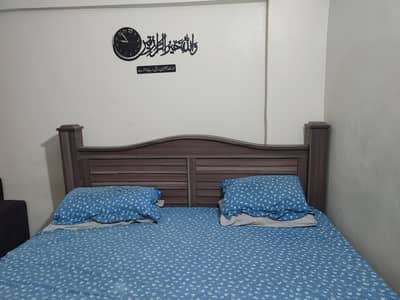King side bed with spring mattress