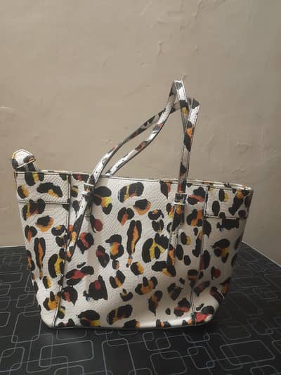 New branded 2 bags  one of M k and other one guss