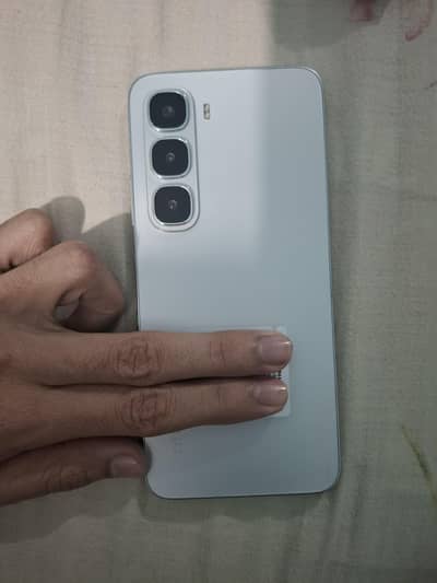 Infinix hot 60i 6/128 under warranty