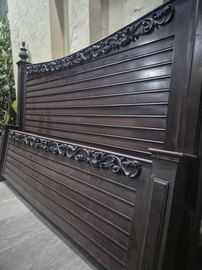 bed with side tables and dressing table