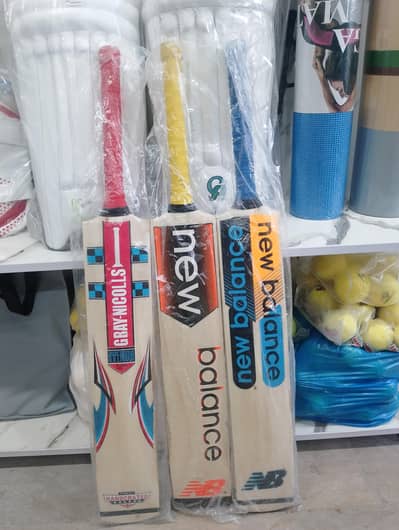RS. 1000 - Wood Handle Tape Ball Bats Available