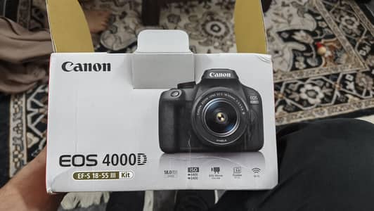 Canon EOS 4000D DSLR camera with an EF-S 18-55 III Kit lens.