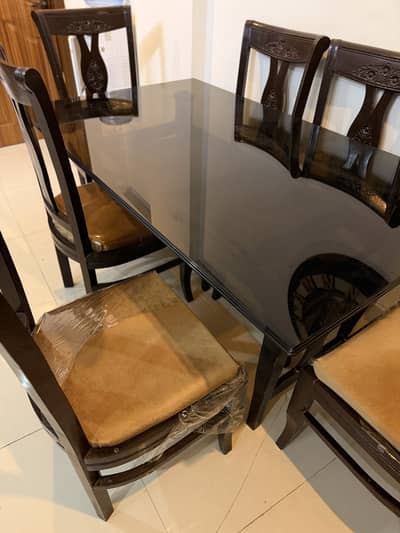 6 seater heavy woodem 2 tier glass top dining table