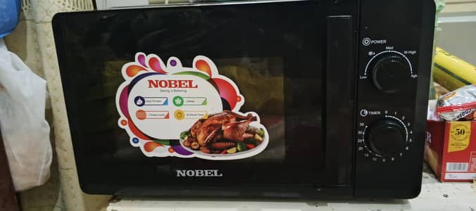 Nobel microwave oven new hai 1 month use