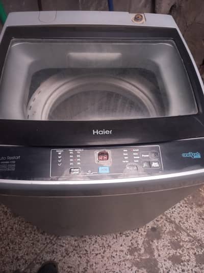 HAIER. . FULLY AOUTOMATIC. . 9.5. KG. . . TOTAL ORIGIONAL. PANEIL. NEEAT CALEEN