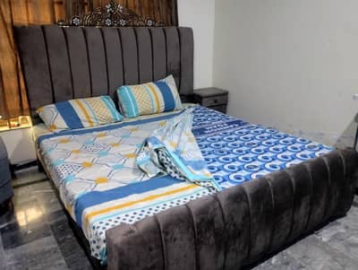 king size bed with side tables and mattress