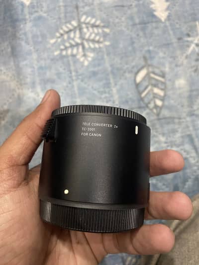 Sigma 2X zooming mount for canon lens O3l7.4OO47O7