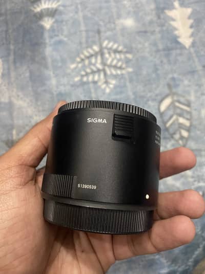 Sigma 2X zooming mount for canon lens O3l7.4OO47O7