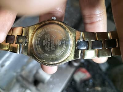 swistar gold plated watch  22k ki ha.  03206064220