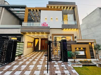 A PRIME LOCATION 5 MARLA HOUSE FOR SALE IN RAFI BLOCK SECTOR E BAHRIA TOWN LAHORE