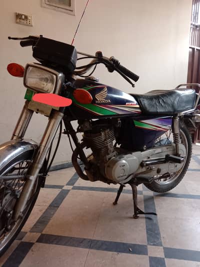 Honda 125 total genioun