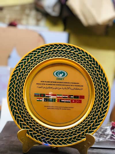Metal golden Ajrak award plate