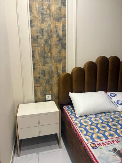 new bed and side tables with dressing