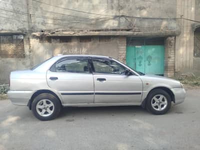 Suzuki baleno JXR 2002 power steering power windows.