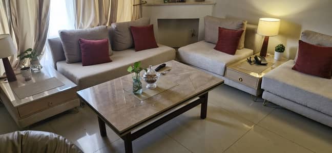 Almost new, 5 seater sofa with 2 side tables