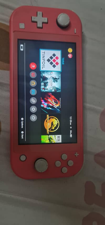 Nintendo switch lite with games and pouch. Jailbreaked