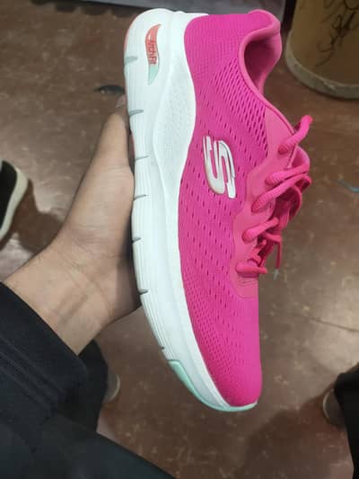 Skechers Arch Fit Infinity Cool women's sneaker in hot pink.