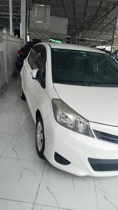Toyata Vitz 2014 model, 2018 imported in white color