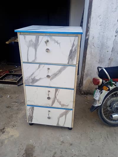 Coustmized cabnet with four drawers on wheels New in laminated sheet