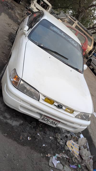 Toyota indus corolla 1999 desal covt petrol manual urgent sale.