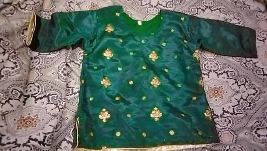Fancy green lehnga for 10 year age girl .