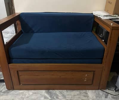 Queen sized sofa cum bed