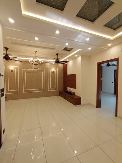 Modern 10 Marla Brand New House with Parking Space for Sale in Garden Town, Lahore