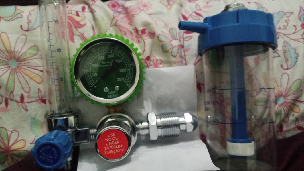 Nebulizer, suction unit, oxygen regulator and pulse oximeter 3