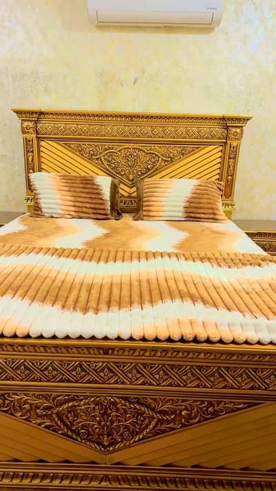 Stylish king size bed with mattress, side tables and dressing table