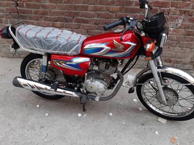 honda 125 red colour all original